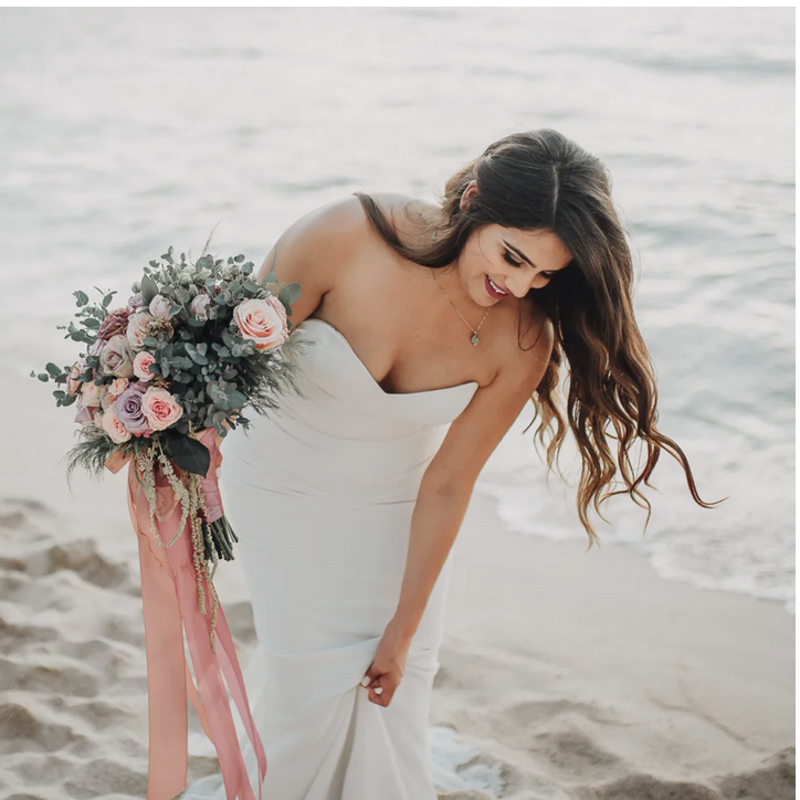 Luxury and Blush Events bride on the beach